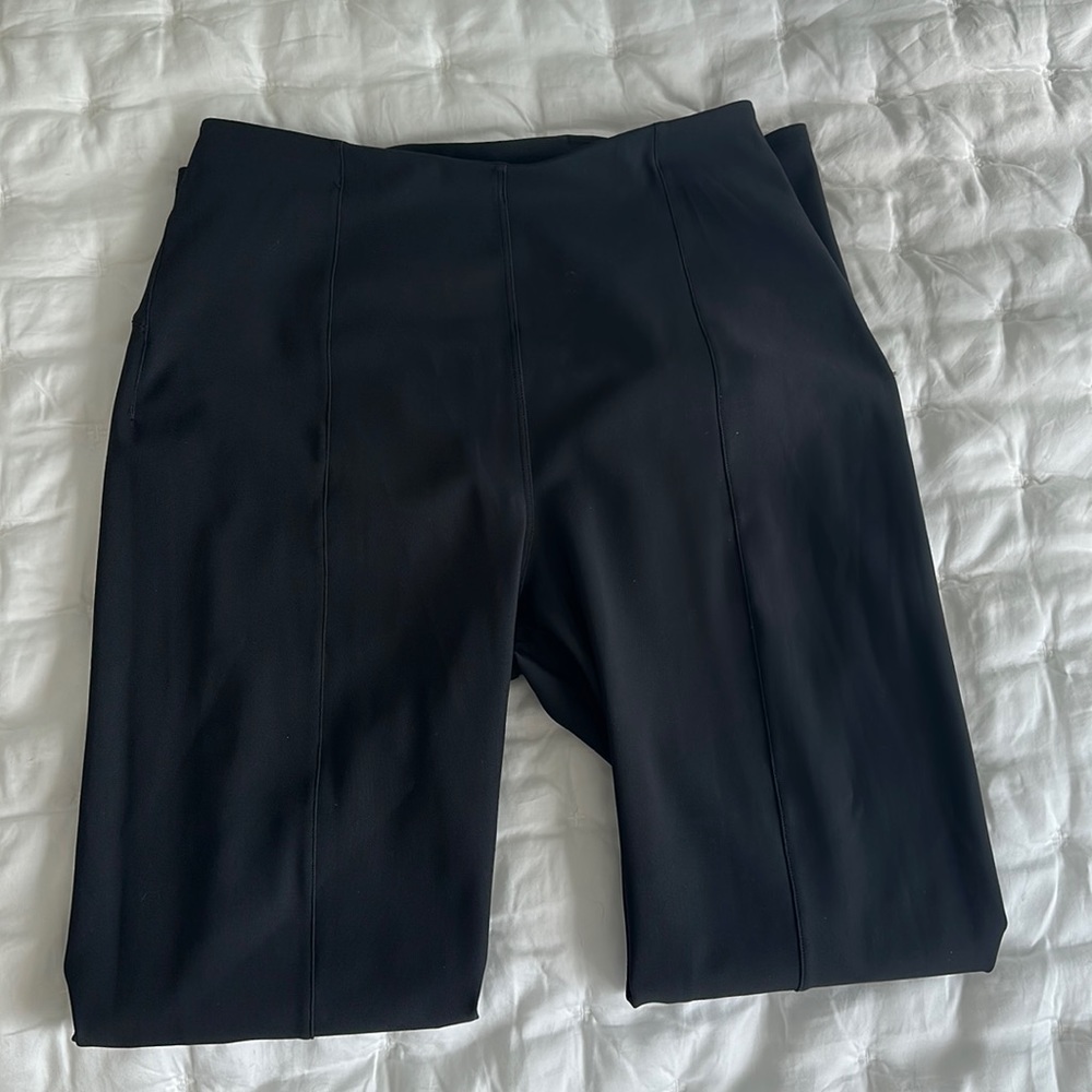 Lululemon skinny gently warm pants for work in office setting.